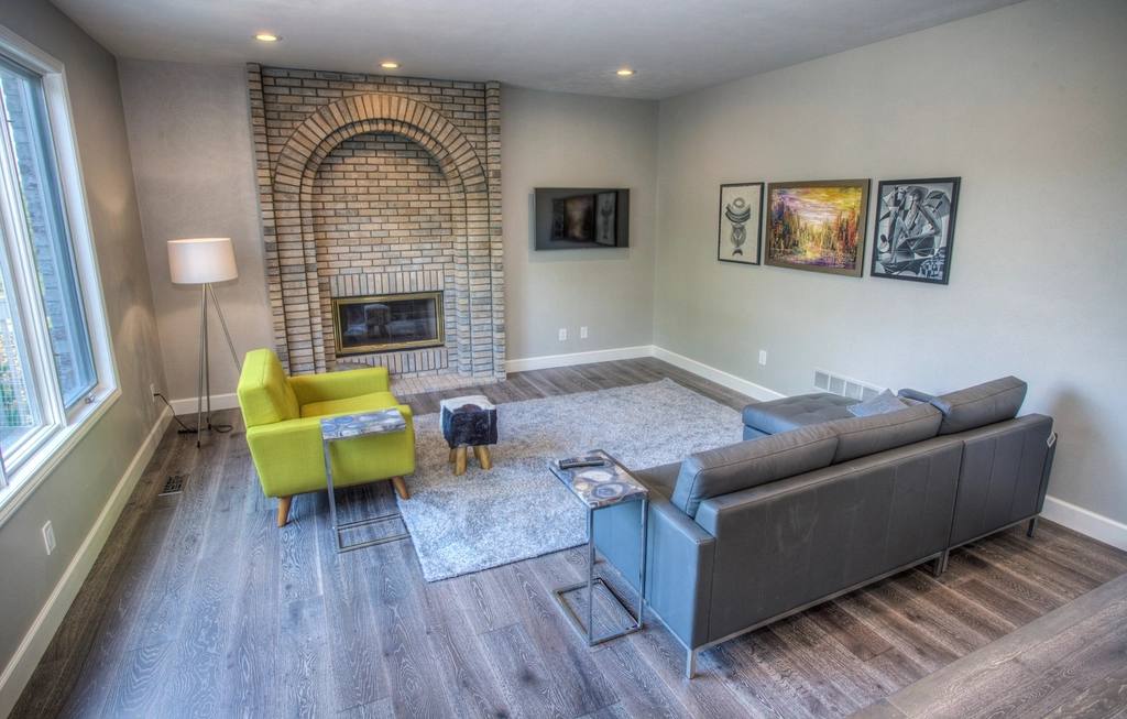 Living room with wide-plank hardwood flooring